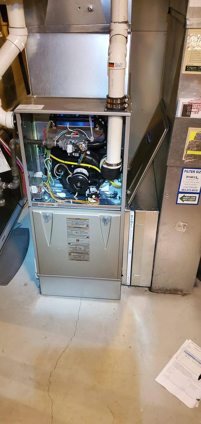 Professional furnace cleaning showing thorough component cleaning