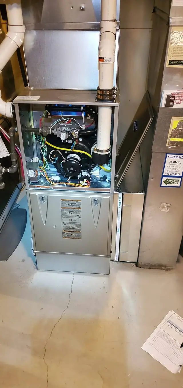 Professional furnace cleaning showing thorough component cleaning